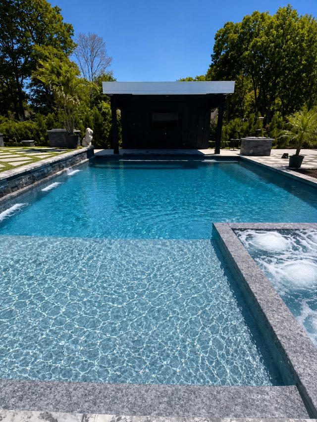 🏁🏝️ Every detail in this backyard was designed to work together. From the clean lines of the pool and raised spa to the modern pool house, checkerboard patio, and tropical landscaping, this project was built to feel like a private resort right at home.

📍Dix Hills, Long Island NY

Swipe through for a closer look at some of our favorite details.

#harborpoolsandpatio #longislandpools #backyarddesign #luxurypool #poolbuilder